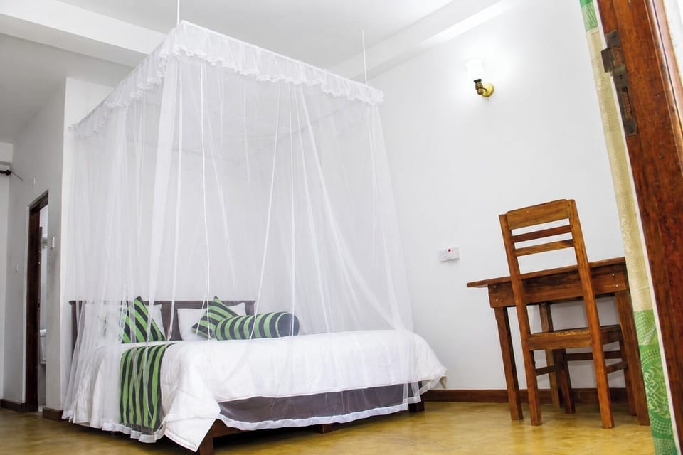 Double Room | Blackout drapes, bed sheets