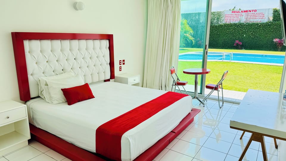 Deluxe Room, 1 King Bed, Air conditioning, Pool View | Egyptian cotton sheets, premium bedding, down comforters