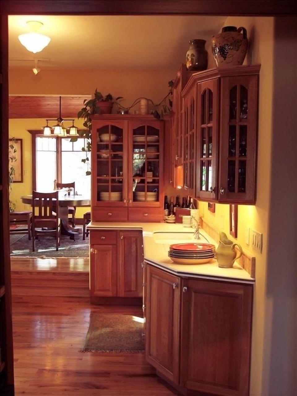 Kitchen with dining room in the background
