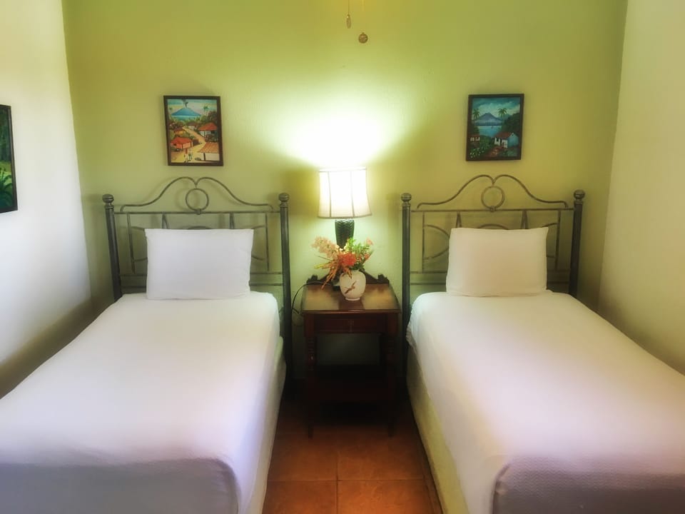 Premium Suite, Multiple Beds, Non Smoking, Ocean View | 1 bedroom, iron/ironing board, WiFi (free), bed sheets