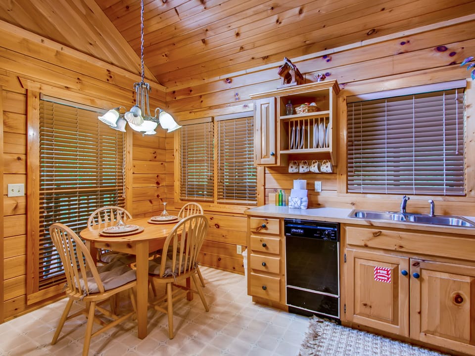 Cozy nook perfect for dining or games. Rustic yet stylish kitchen is ready for all of your cooking needs.