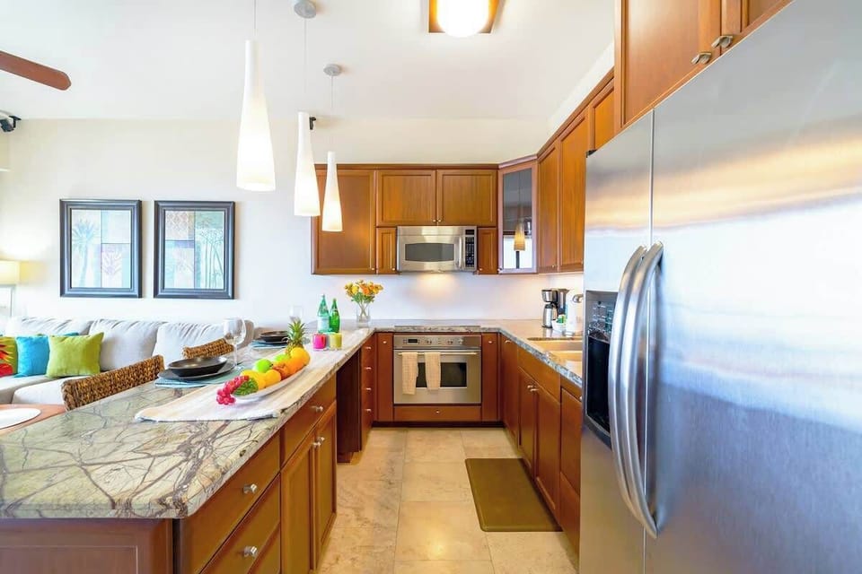Kitchen with microwave, cook top stove, oven, dripped coffee maker, dishwasher, fridge and freezer!