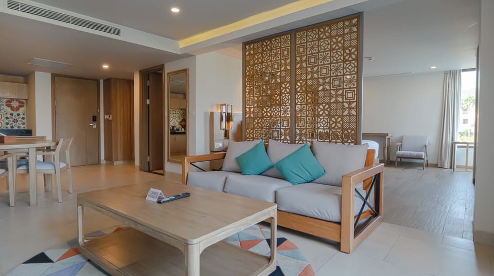 One Bedroom Balcony Suite | Living area | LCD TV
