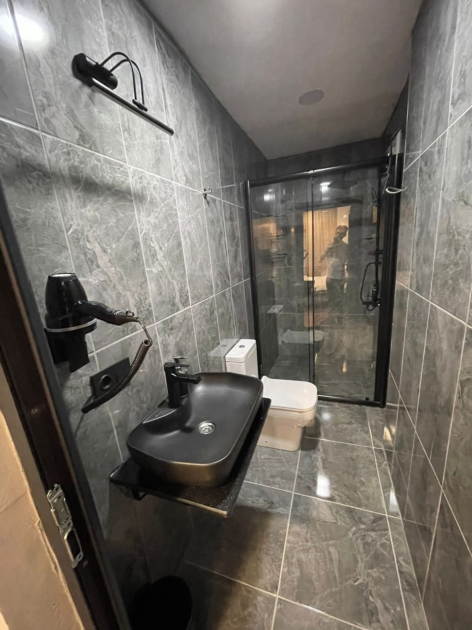 Shower, hydromassage showerhead, designer toiletries, hair dryer