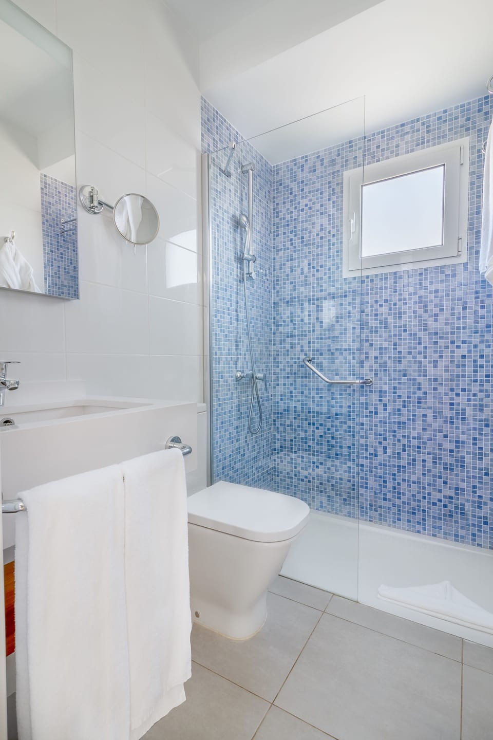 Shower, bathrobes, towels