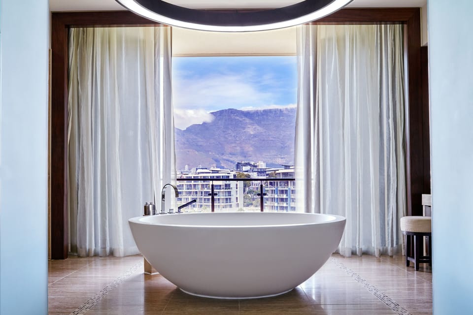 Suite (Table Mountain) | Bathroom | Separate tub and shower, deep soaking tub, rainfall showerhead