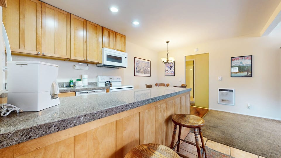 Condo, 1 Bedroom | Private kitchen | Full-size fridge, microwave, oven, stovetop