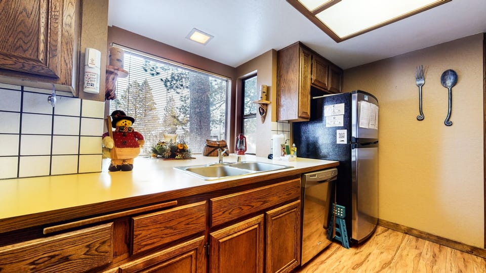 Condo, 2 Bedrooms | Private kitchen | Full-size fridge, microwave, oven, stovetop