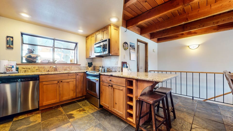 Condo, 2 Bedrooms | Private kitchen | Full-size fridge, microwave, oven, stovetop