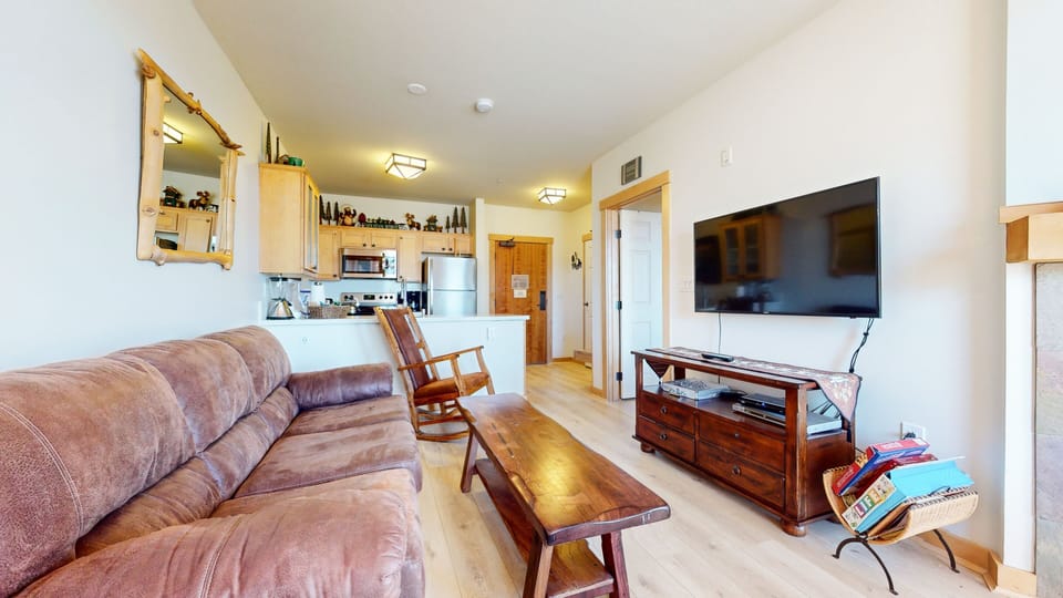 Condo, 1 Bedroom | Living area | Flat-screen TV, fireplace, DVD player