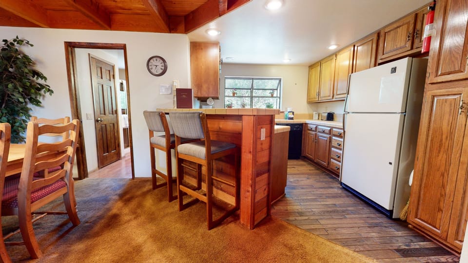 Condo, 2 Bedrooms | Private kitchen | Fridge, microwave, oven, stovetop