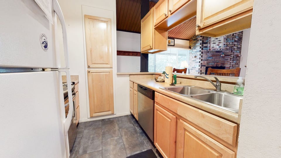 Condo, 1 Bedroom | Private kitchen | Full-size fridge, microwave, oven, stovetop