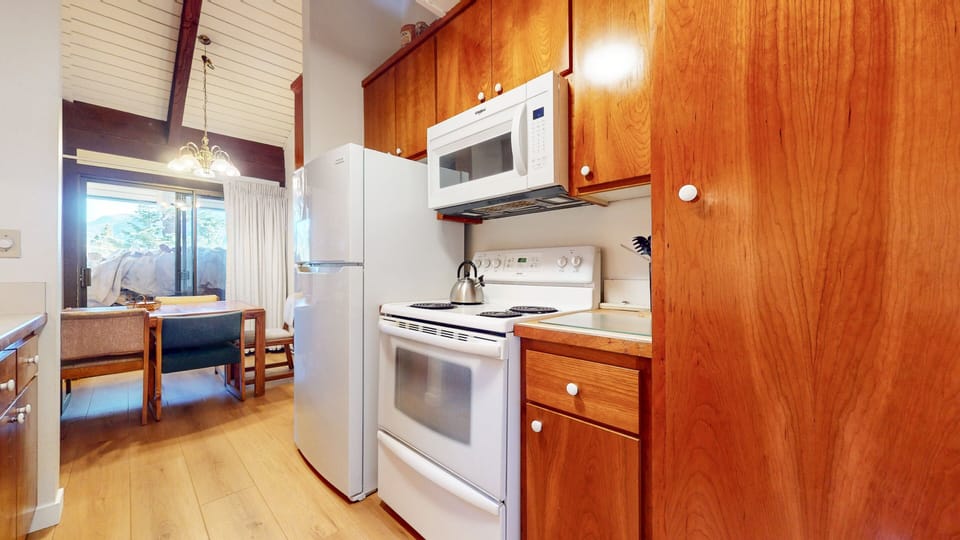 Condo, 1 Bedroom | Private kitchen | Full-size fridge, microwave, oven, stovetop