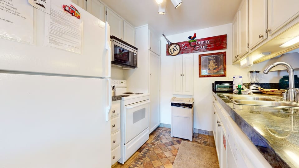Condo, 1 Bedroom | Private kitchen | Full-size fridge, microwave, oven, stovetop