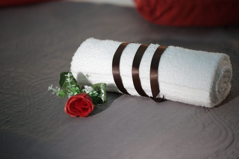 Suite, Sea View | Minibar, in-room safe, desk, blackout drapes