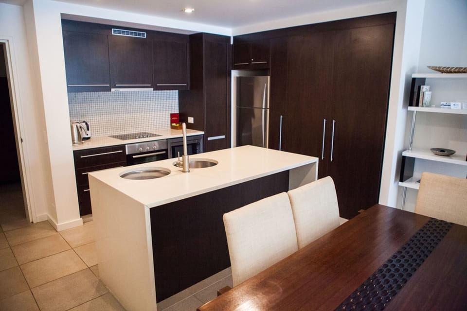 Luxury Apartment, 2 Bedrooms, Pool View, Poolside | Private kitchen | Full-size fridge, microwave, oven, stovetop