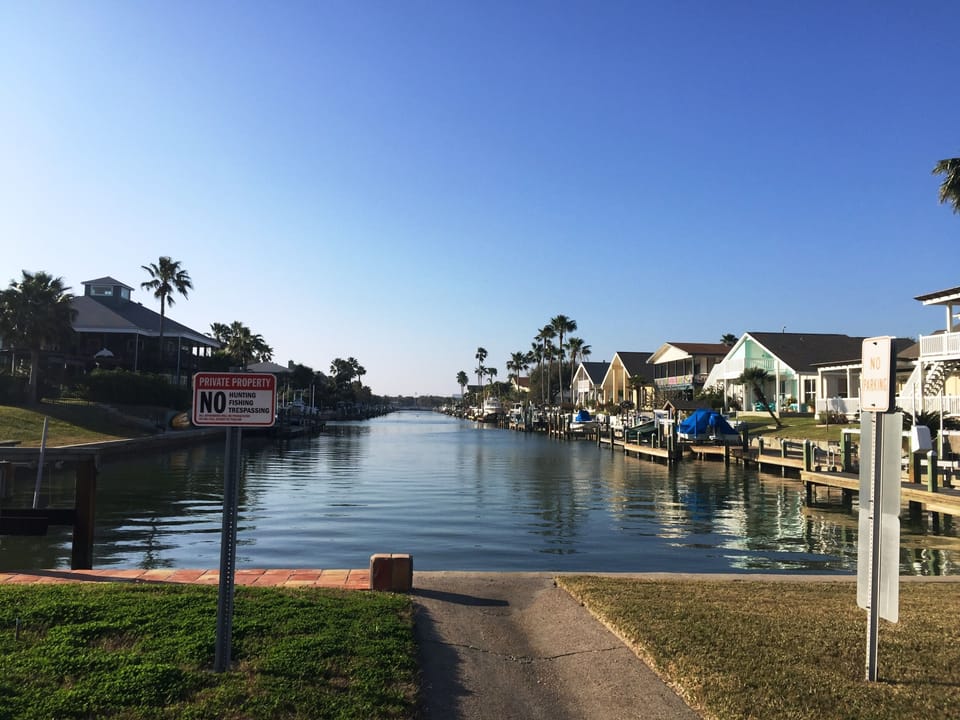 The front of the house enjoys a beautiful view of a canal (no access).