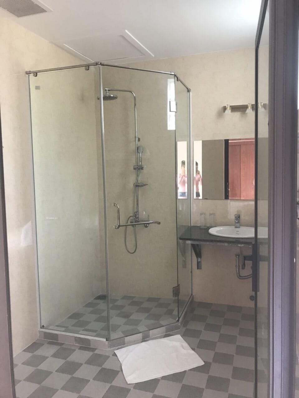 Shower, free toiletries, slippers, towels