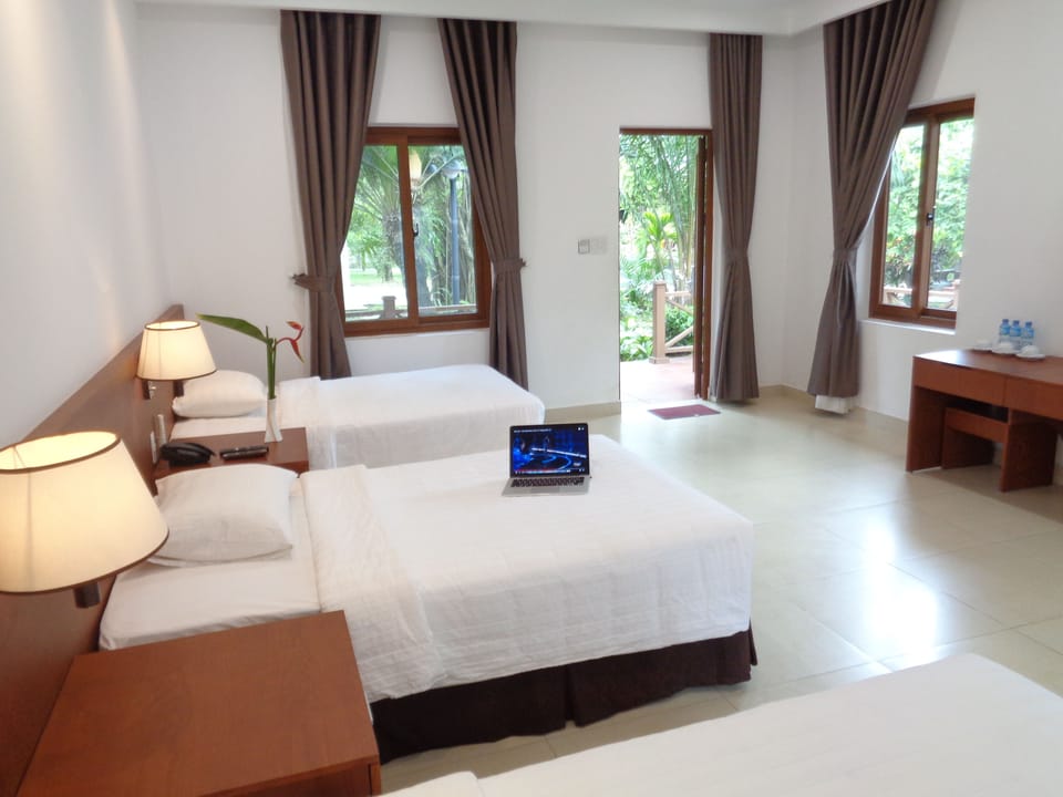 Deluxe Triple Bungalow | Minibar, in-room safe, desk, free WiFi
