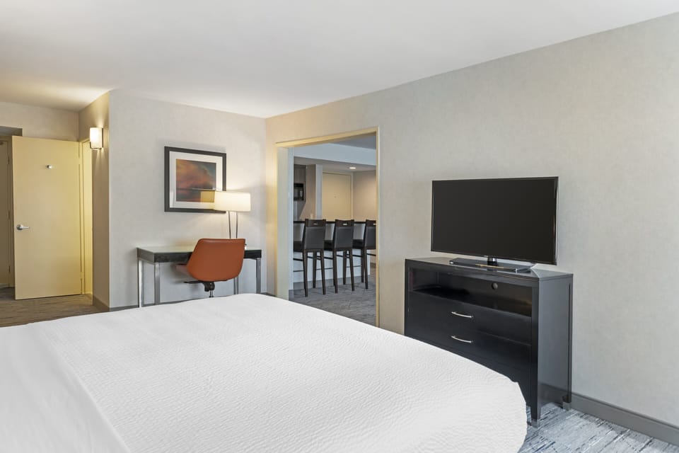 Hypo-allergenic bedding, desk, blackout drapes, iron/ironing board