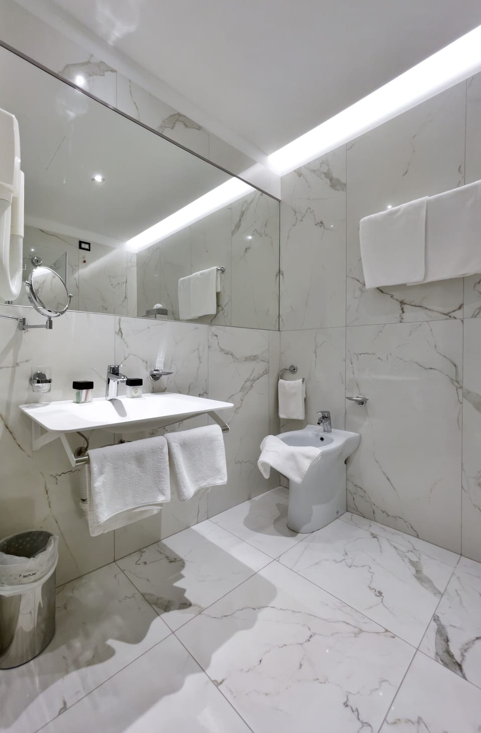 Comfort Room | Bathroom | Shower, rainfall showerhead, designer toiletries, hair dryer