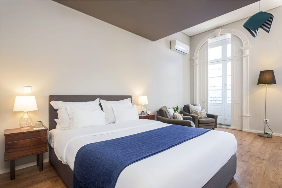 Deluxe Double Room | Minibar, in-room safe, individually decorated, desk