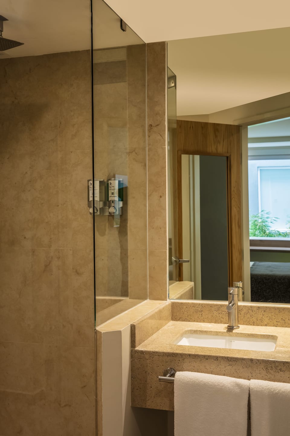Shower, rainfall showerhead, eco-friendly toiletries, towels