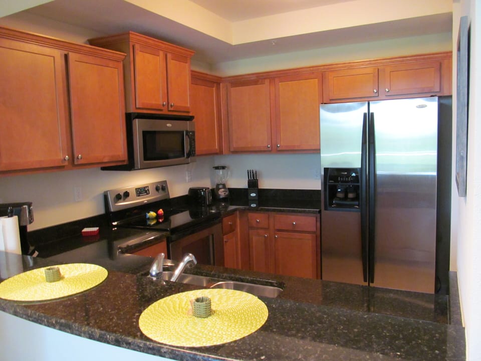 Fully equipped kitchen with new stainless appliances
