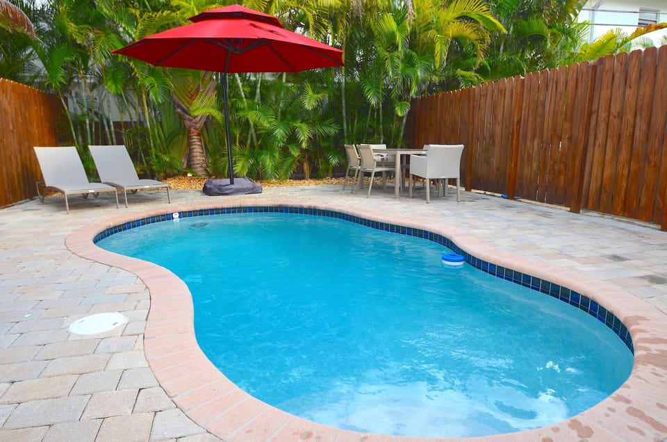 Spectacular Private Rear Yard Features Heated Pool Lounge + Dining...