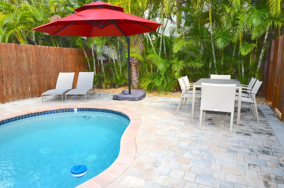 Spectacular Private Rear Yard Features Heated Pool Lounge + Dining...