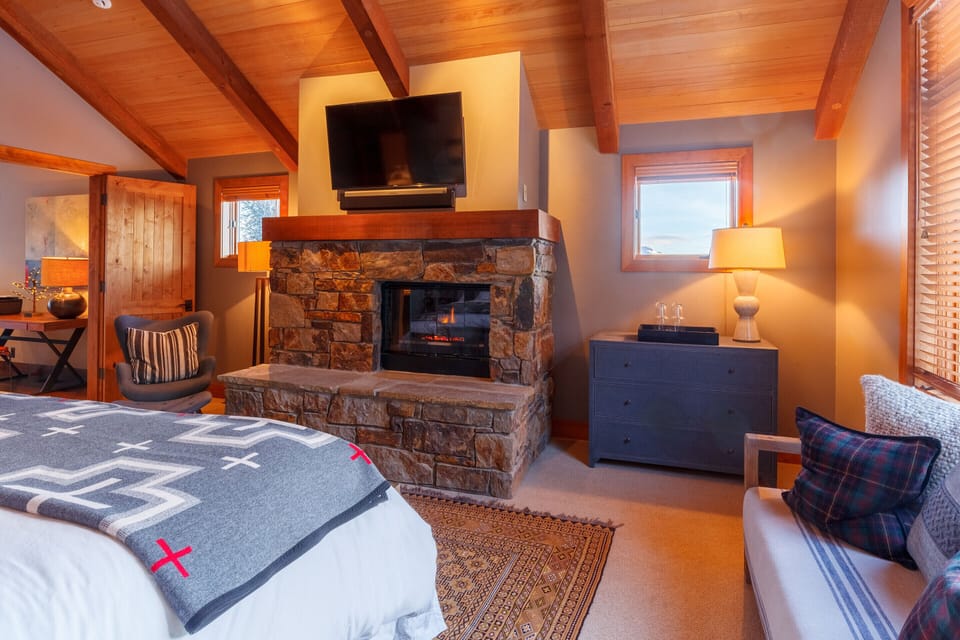 Creature comforts such as TV & Fireplace ensure total relaxation in the Master.