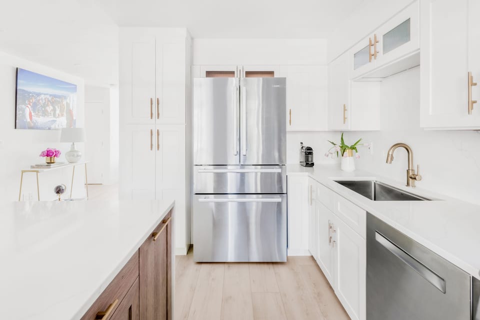 Kitchen with custom cabinets and Bosch Benchmark appliances