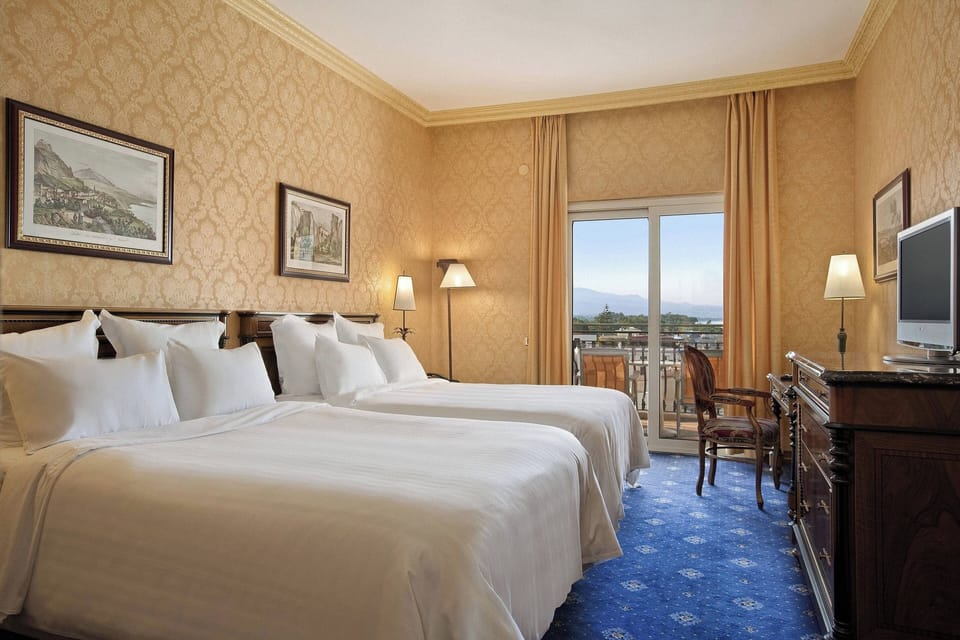 Superior Room, 2 Queen Beds, Partial Sea View | 1 bedroom, premium bedding, down comforters, minibar