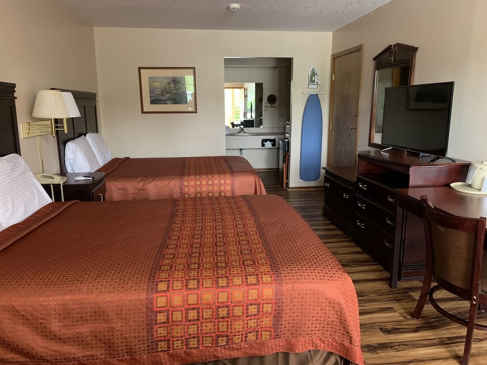 Standard Room, 2 Queen Beds | Iron/ironing board, free WiFi, bed sheets