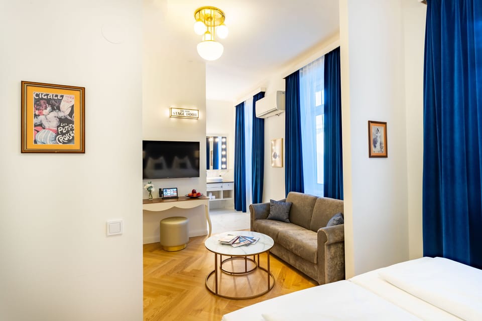 Junior Suite (Superior) | Living area | 22-inch TV with satellite channels