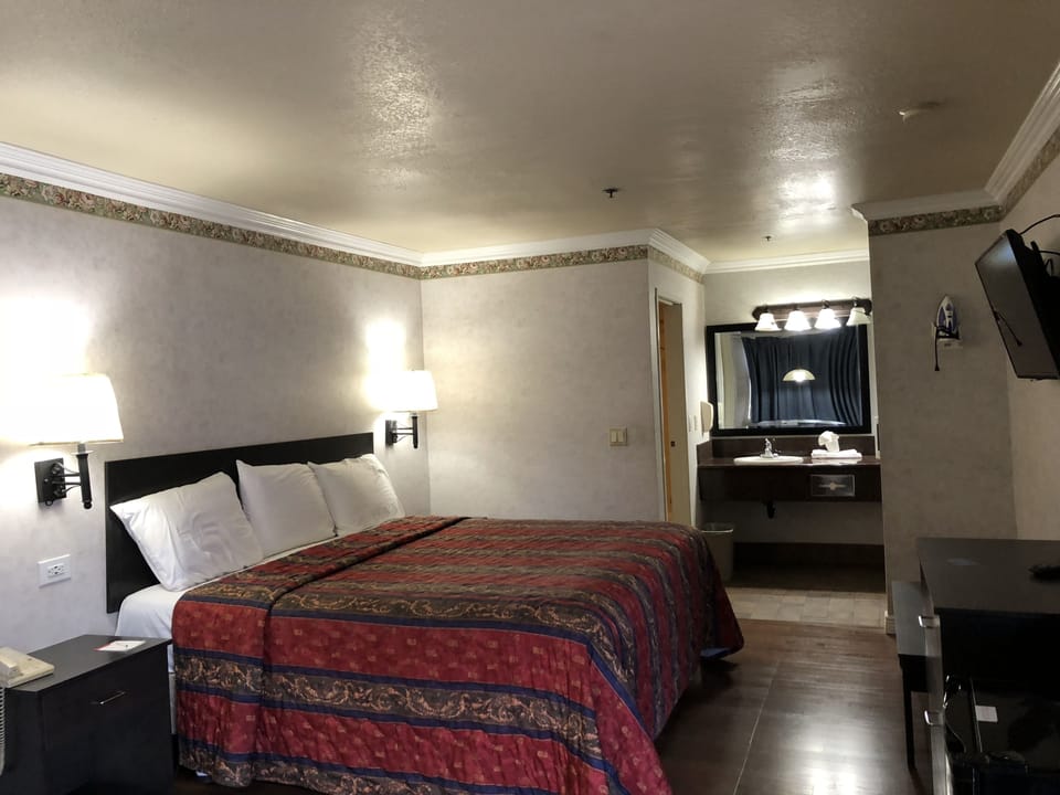 Iron/ironing board, WiFi (free), alarm clocks, bed sheets