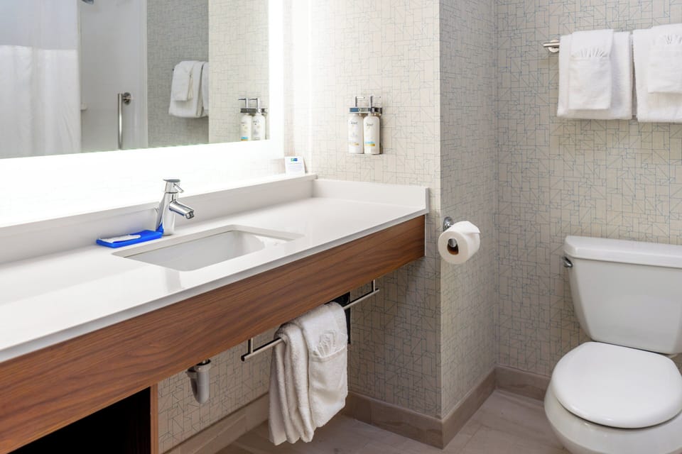 Hair dryer, towels, soap, shampoo
