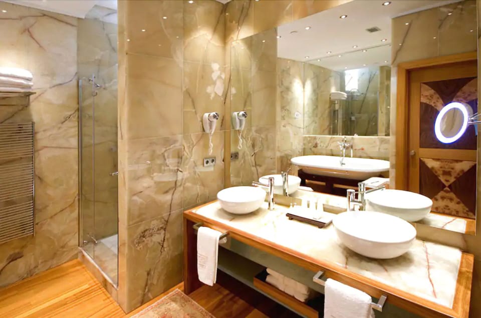 Grand Suite, Terrace, Partial Sea View | Bathroom | Designer toiletries, hair dryer, bathrobes, slippers