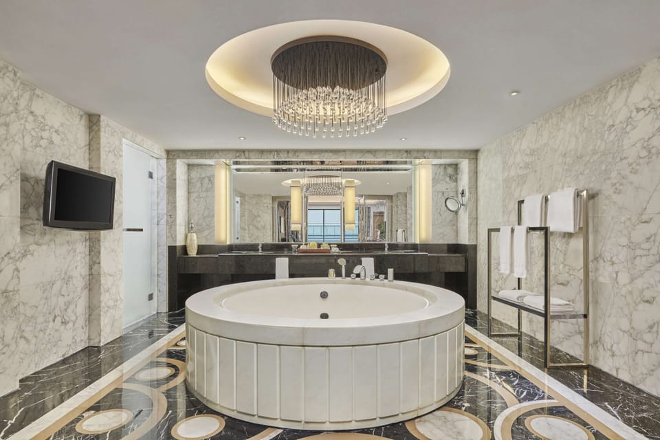 Presidential Suite, 2 Bedrooms, Balcony | Bathroom | Combined shower/tub, hair dryer, bathrobes, slippers