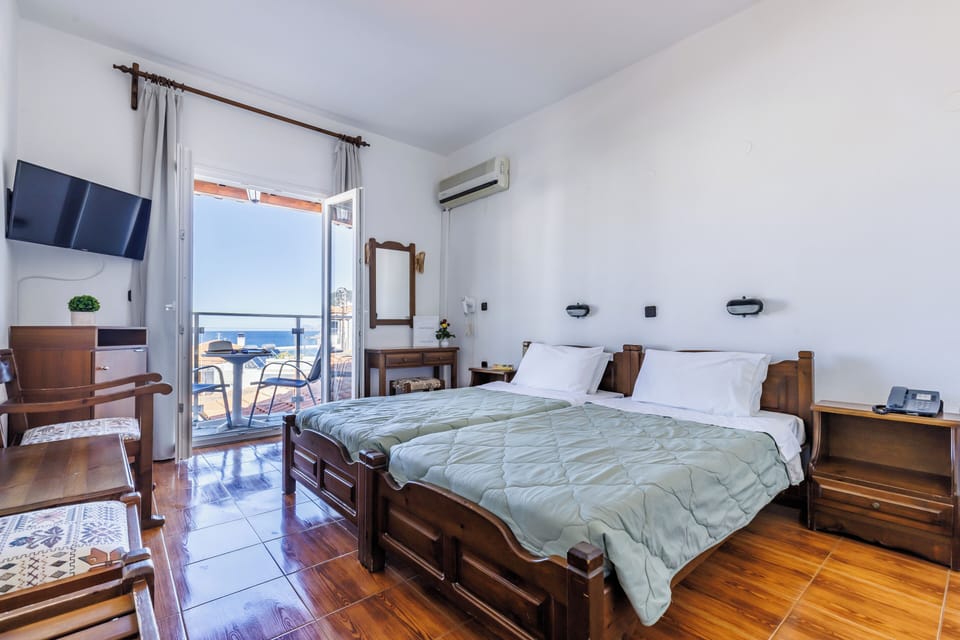 Side Sea View Room | Iron/ironing board, free WiFi, bed sheets