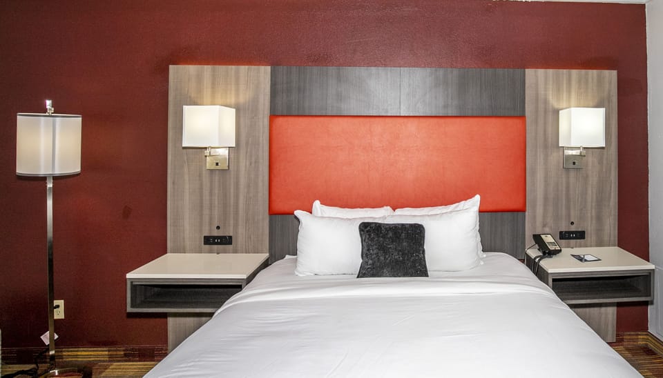 In-room safe, laptop workspace, blackout drapes, soundproofing
