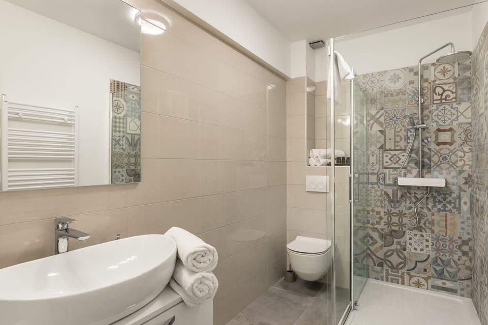 Apartment | Bathroom | Shower, free toiletries, hair dryer, slippers