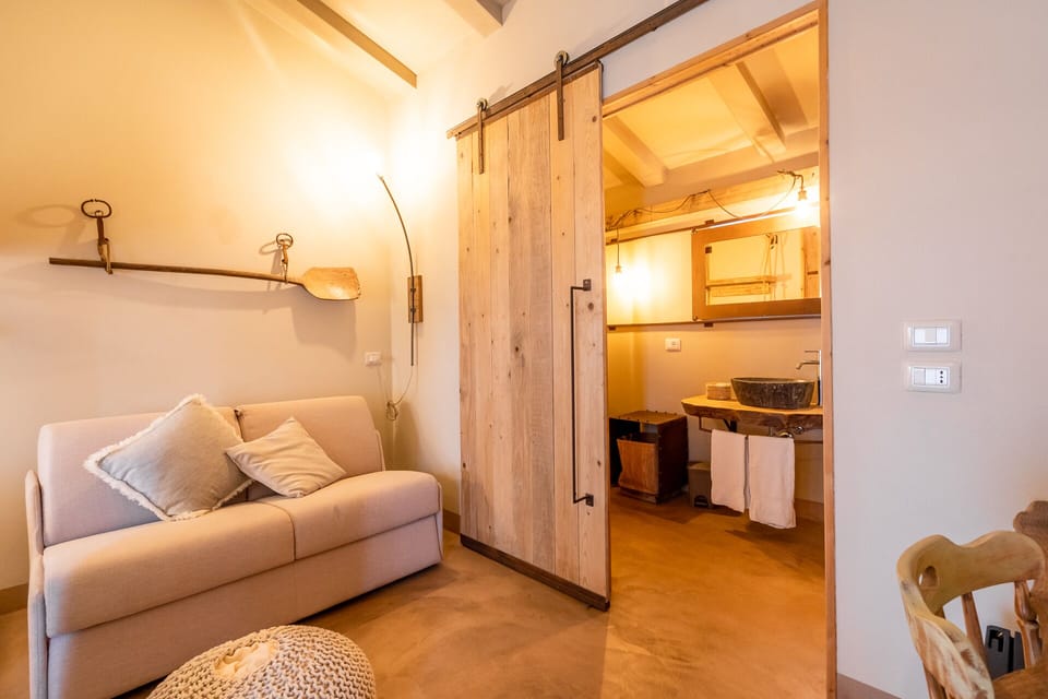 Deluxe Room, 1 Bedroom, Private Bathroom, Pool View | Living area | Flat-screen TV