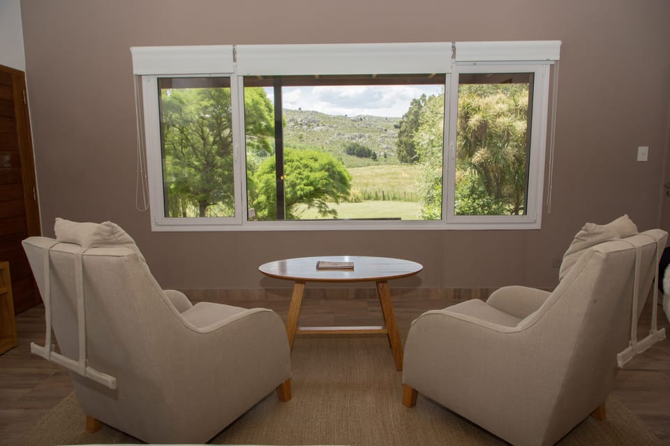 Superior Bungalow, Garden Area | Living area | Flat-screen TV, fireplace
