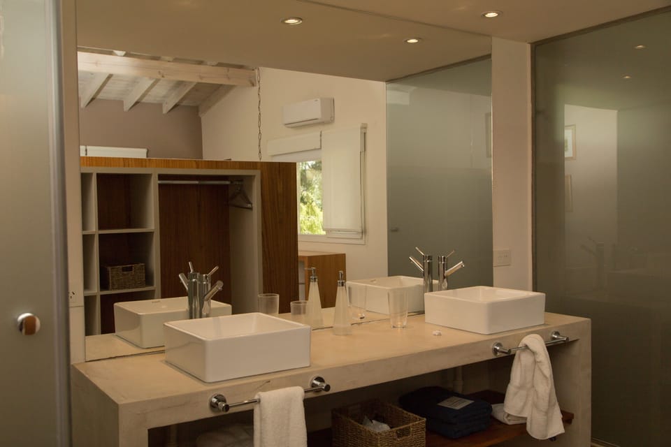 Superior Bungalow, Garden Area | Bathroom | Shower, rainfall showerhead, free toiletries, hair dryer