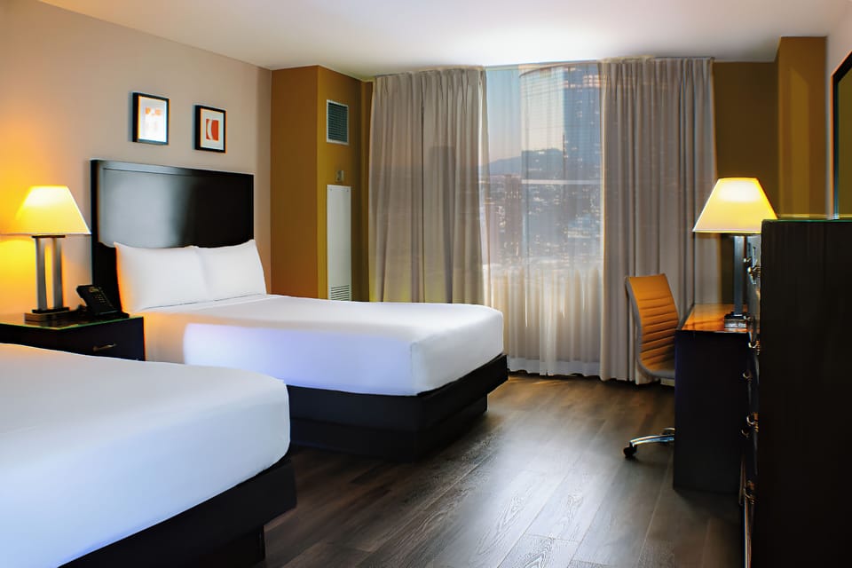West Tower Newly Refreshed Double Queen | In-room safe, blackout drapes, WiFi, bed sheets