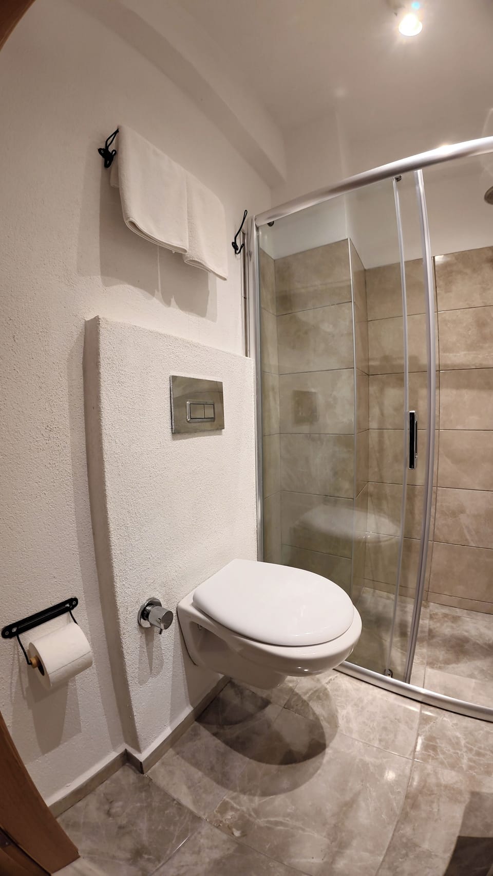 Shower, free toiletries, hair dryer, slippers