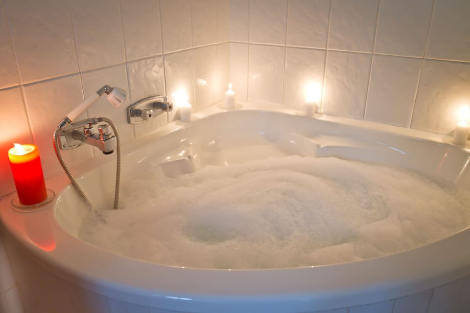 Family Suite, 2 Bedrooms, Pool View | Bathroom | Separate tub and shower, free toiletries, hair dryer, bathrobes