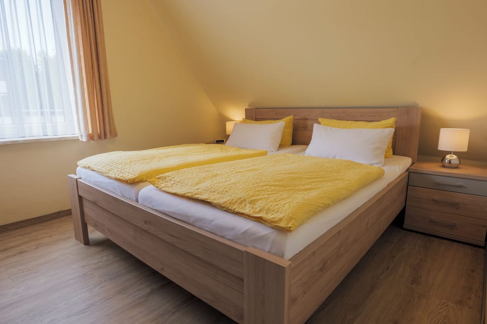 Apartment, 2 Bedrooms | Iron/ironing board, cribs/infant beds, free WiFi, bed sheets