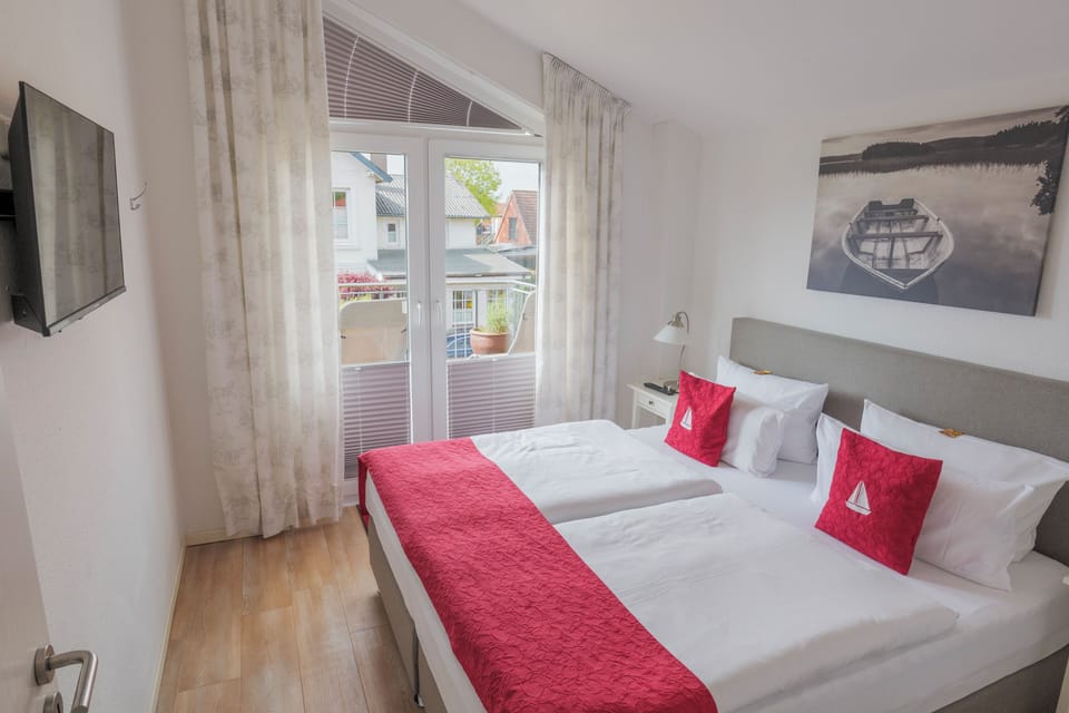 Apartment, 2 Bedrooms | Soundproofing, iron/ironing board, cribs/infant beds, free WiFi